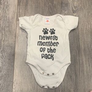White Baby Onesie with Paw Print Design